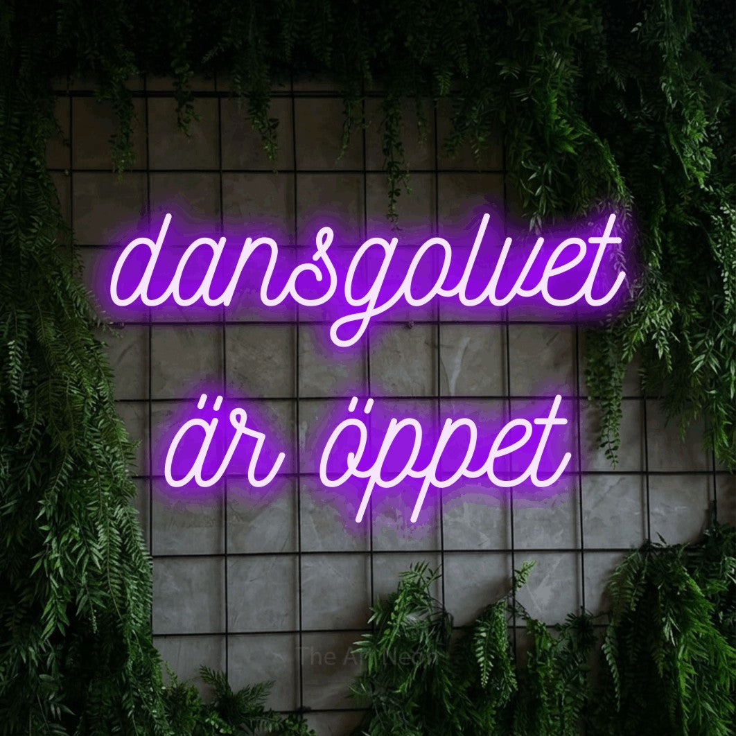 LED neon sign reading “dansgolvet är öppet”, arranged in 2 lines.