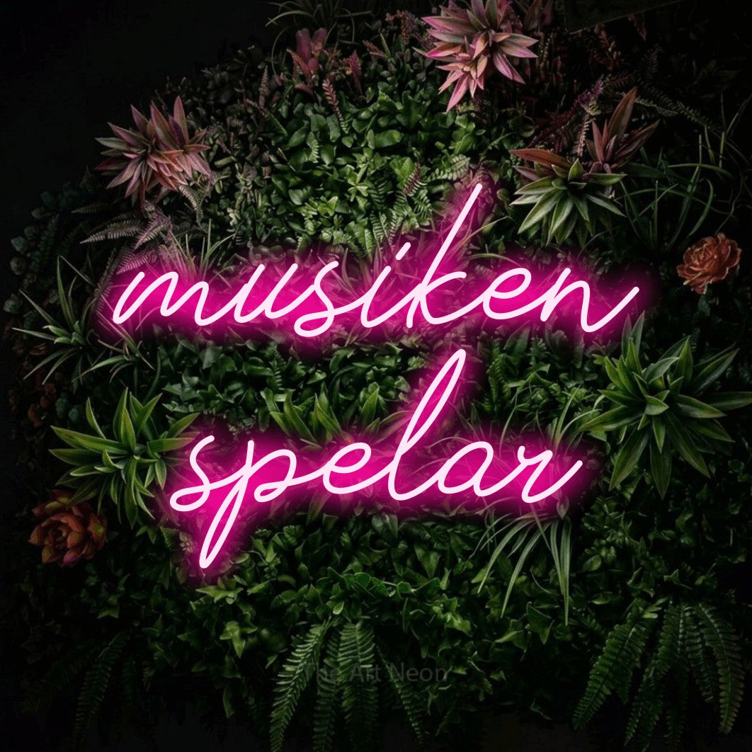 LED neon sign reading “musiken spelar”, arranged in 2 lines.