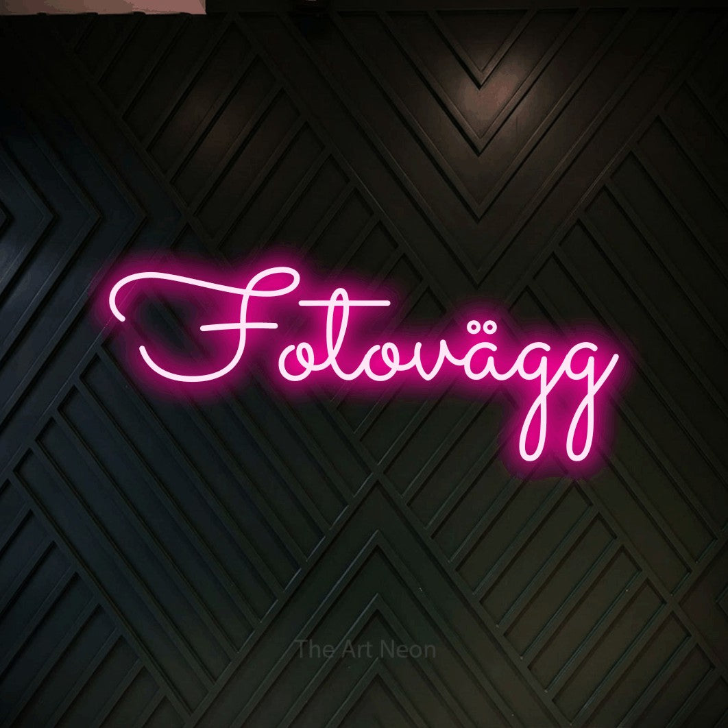 LED neon sign reading “Fotovägg”, arranged in a single line.