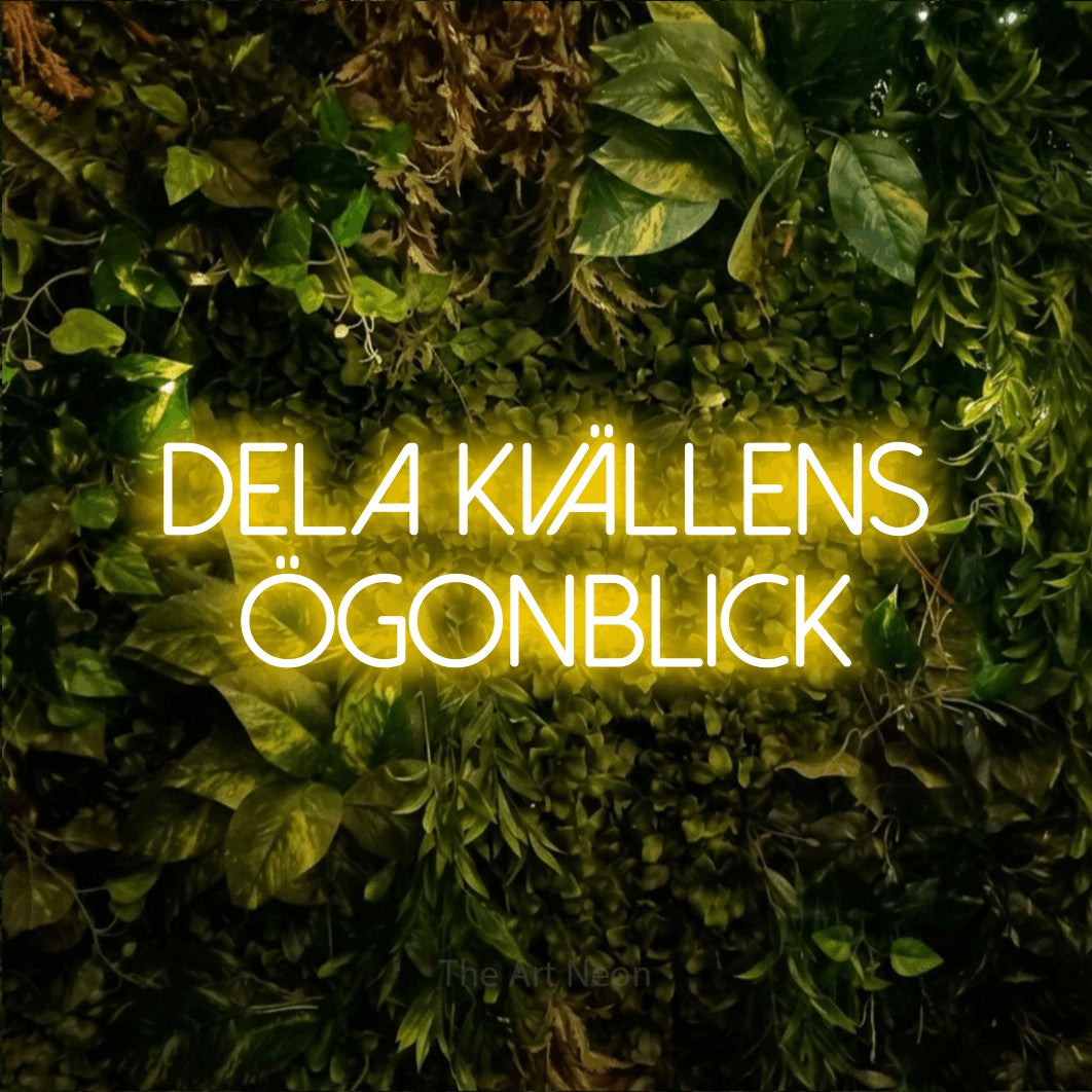 LED neon sign reading “DELA KVÄLLENS ÖGONBLICK”, arranged in 2 lines.