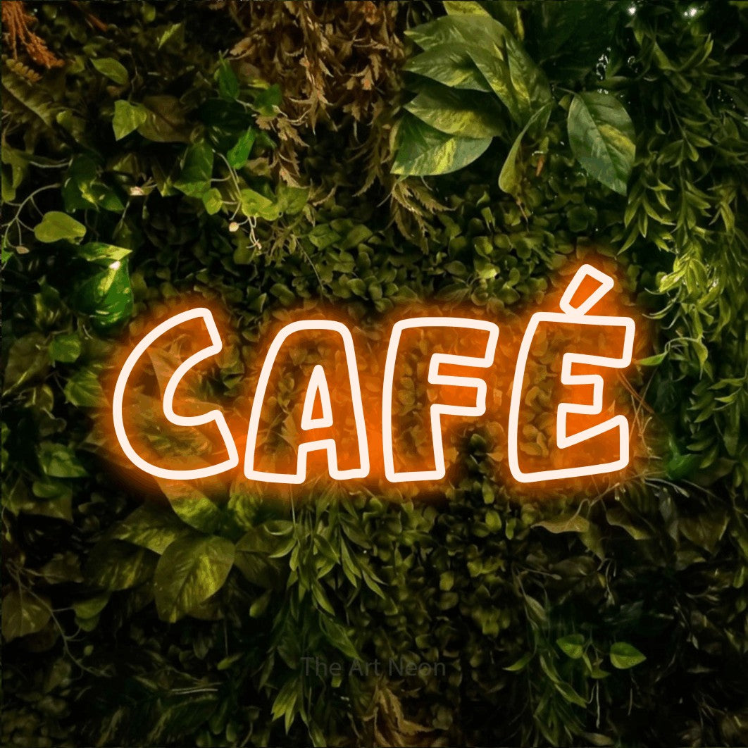 LED neon sign reading “café”, arranged in a single line.