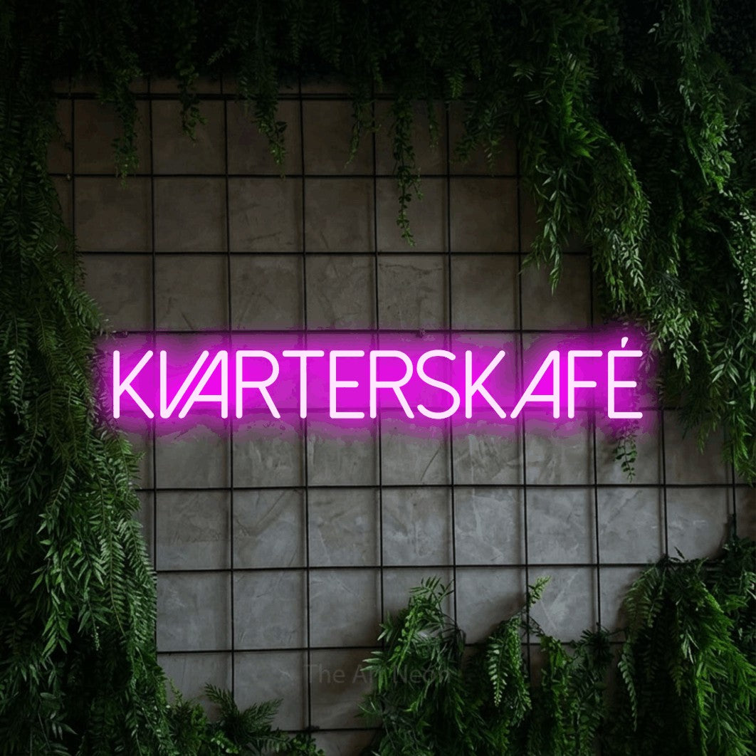 LED neon sign reading “KVARTERSKAFÉ”, arranged in a single line.