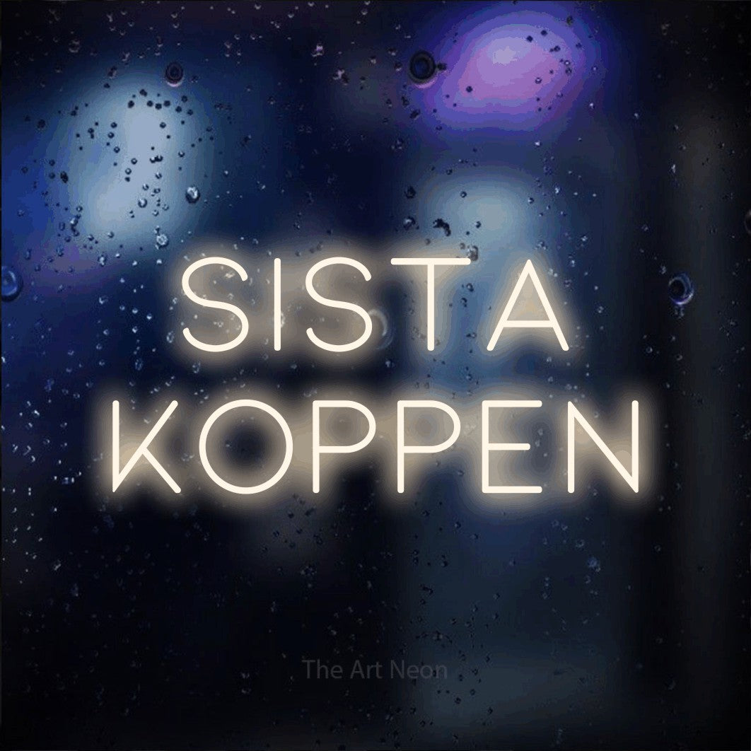 LED neon sign reading “SISTA KOPPEN”, arranged in 2 lines.