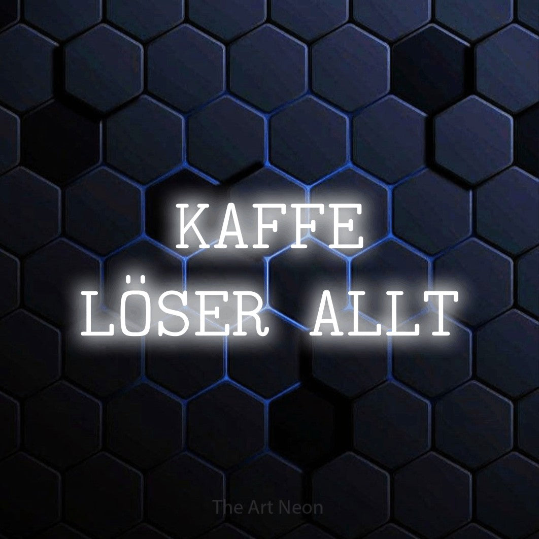 LED neon sign reading “KAFFE LÖSER ALLT”, arranged in 2 lines.