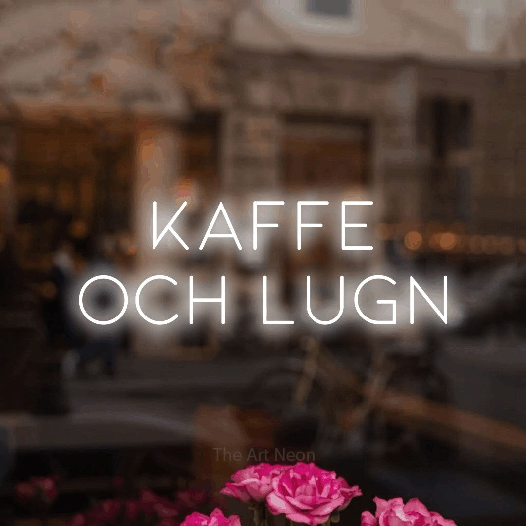 LED neon sign reading “KAFFE OCH LUGN”, arranged in 2 lines.