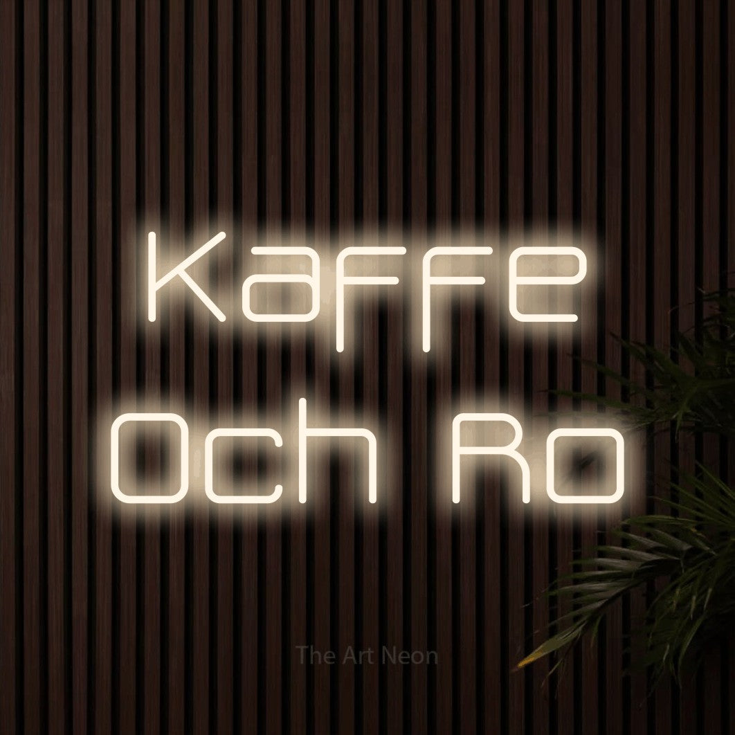 LED neon sign reading “Kaffe Och Ro”, arranged in 2 lines.