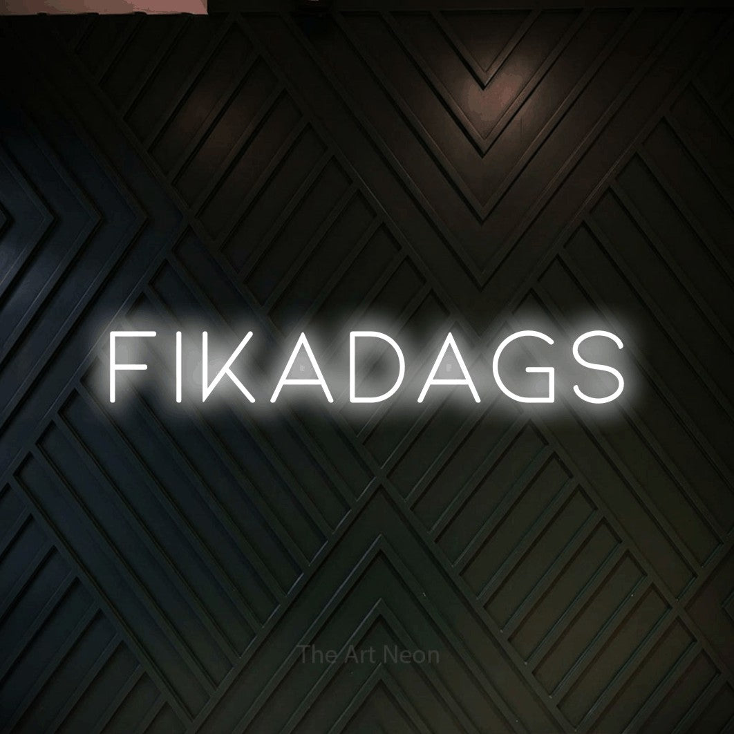 LED neon sign reading “fikadags”, arranged in a single line.
