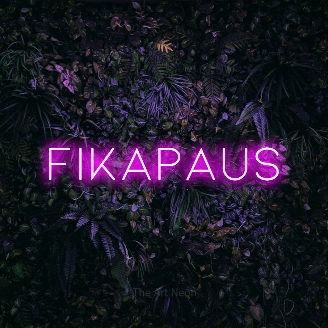 LED neon sign reading “FIKAPAUS”, arranged in a single line.