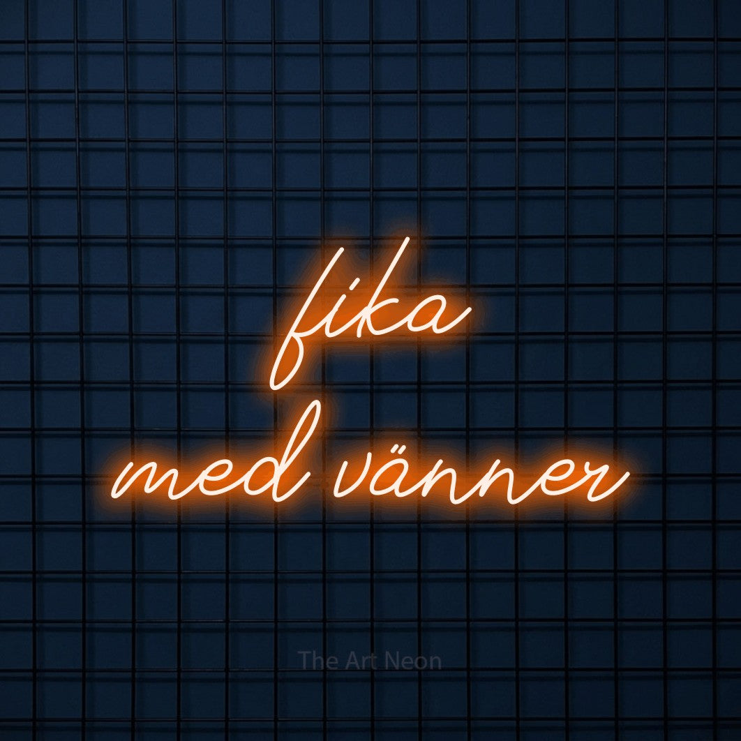 LED neon sign reading “fika med vänner”, arranged in 2 lines.