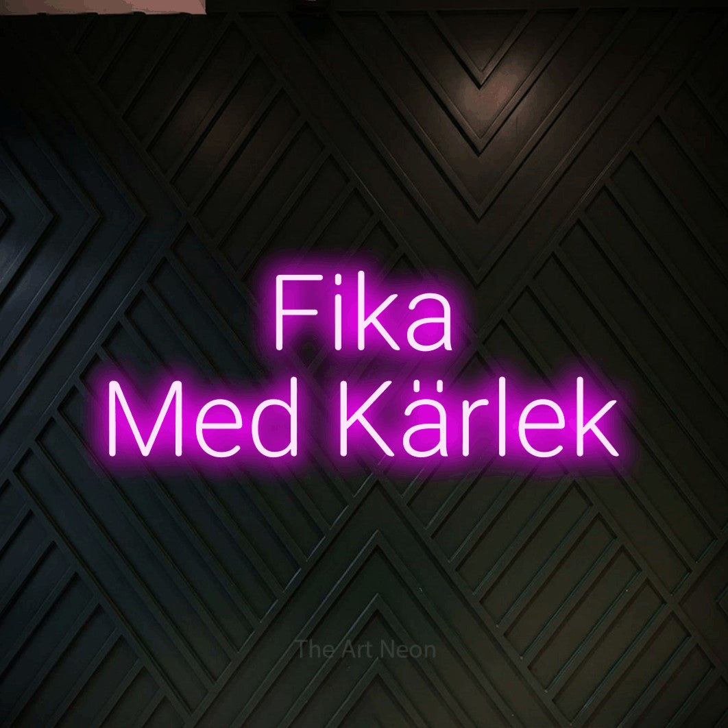 LED neon sign reading “Fika Med Kärlek”, arranged in 2 lines.