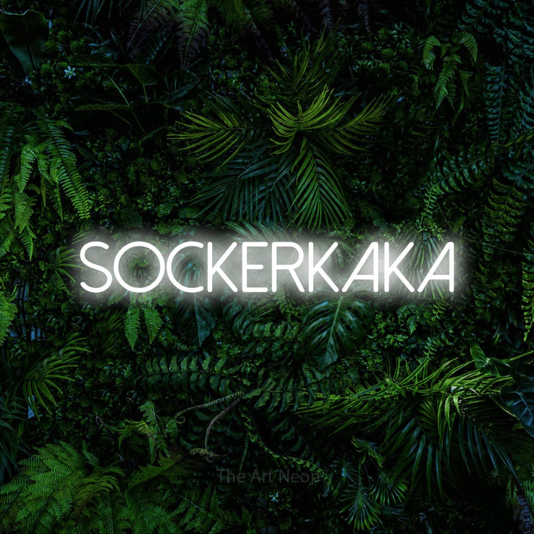 LED neon sign reading “SOCKERKAKA”, arranged in a single line.