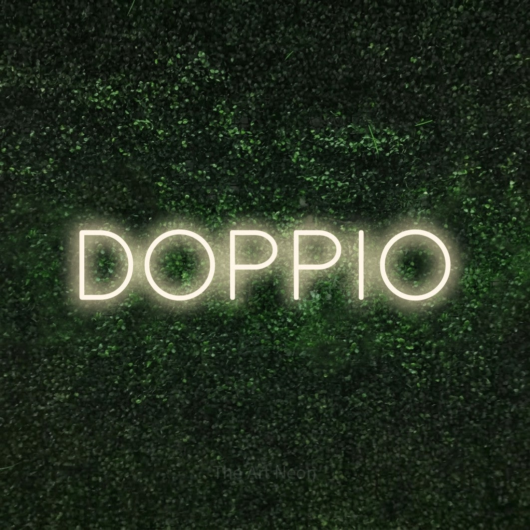 LED neon sign reading “Doppio”, arranged in a single line.