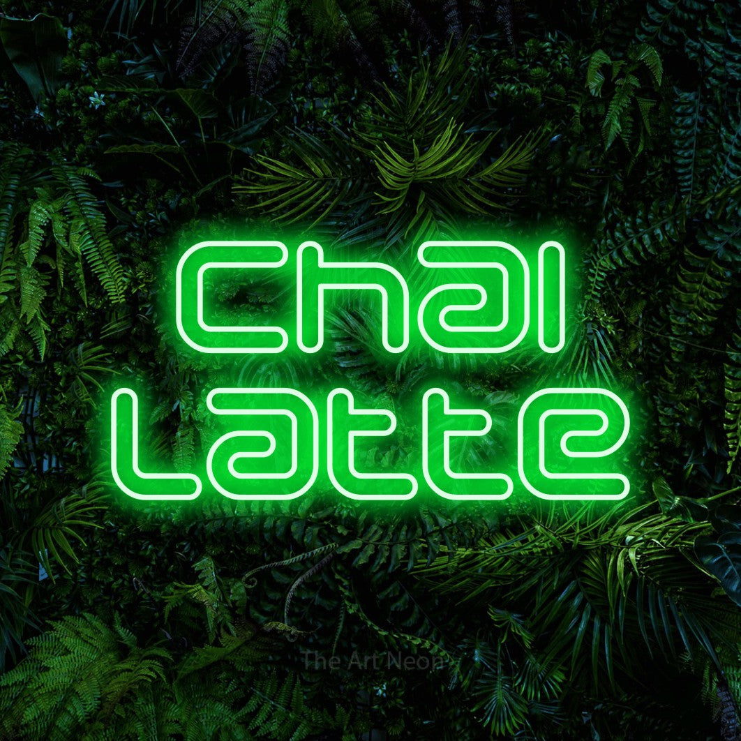 LED neon sign reading “chai latte”, arranged in 2 lines.