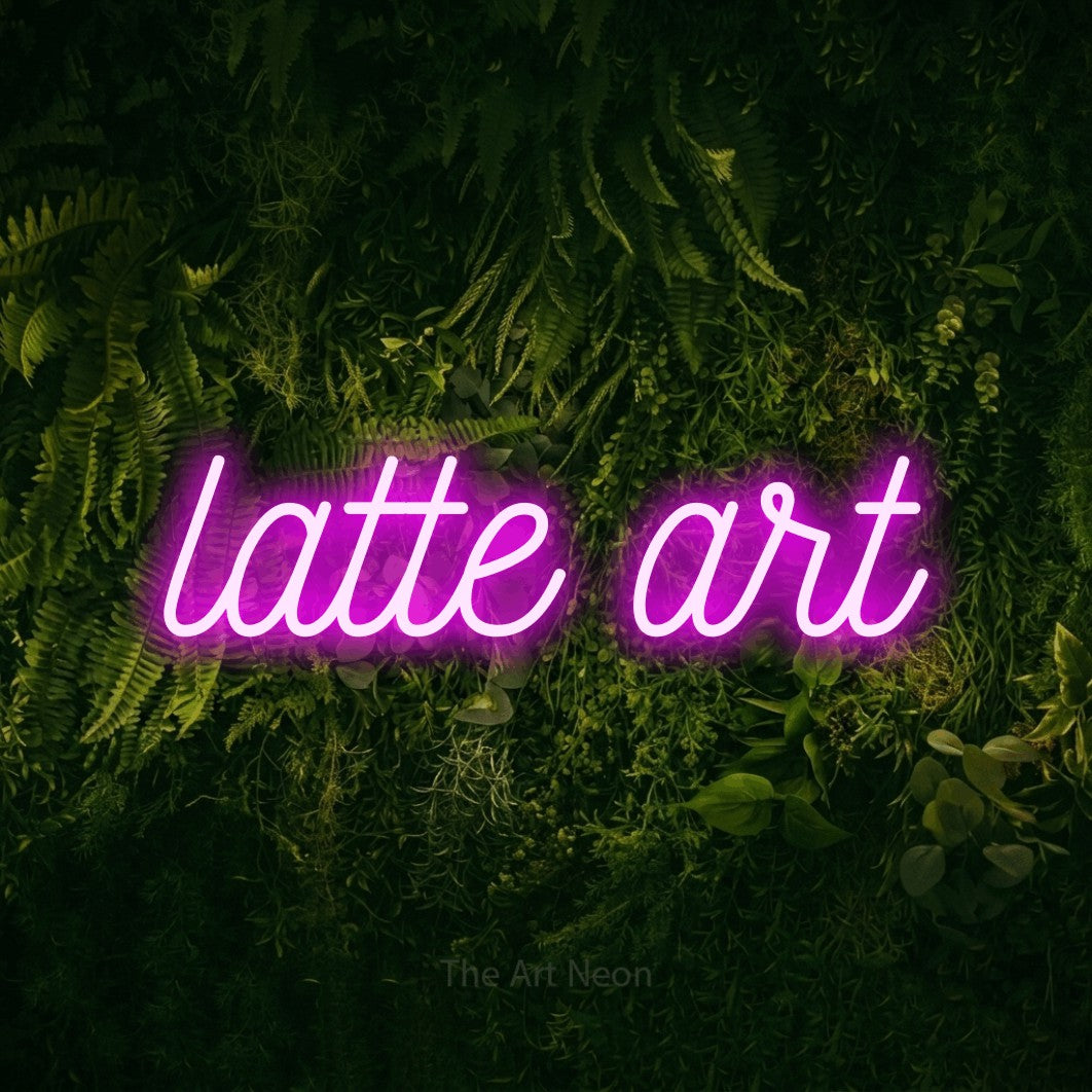 LED neon sign reading “latte art”, arranged in a single line.