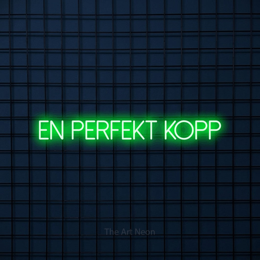 LED neon sign reading “En Perfekt Kopp”, arranged in a single line.