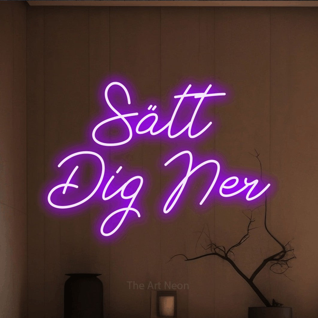 LED neon sign reading “Sätt Dig Ner”, arranged in 2 lines.