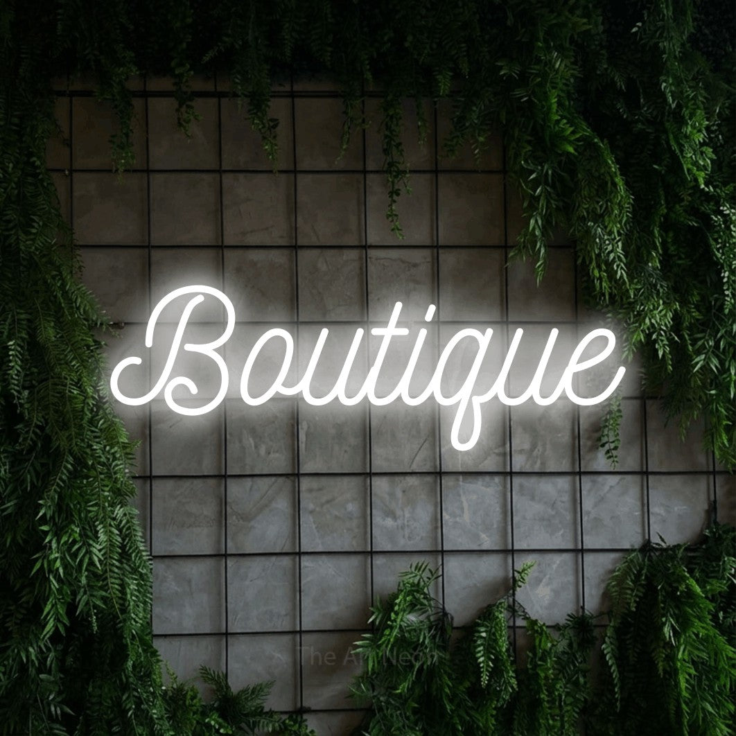 LED neon sign reading “Boutique”, arranged in a single line.