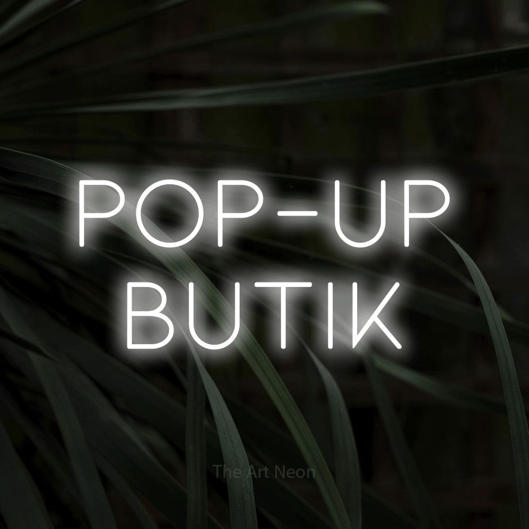 LED neon sign reading “POP-UP BUTIK”, arranged in 2 lines.