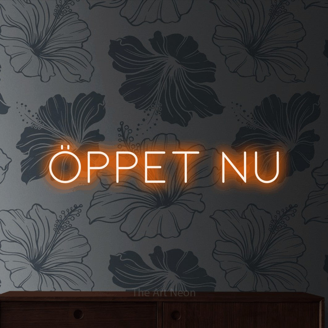 LED neon sign reading “ÖPPET NU”, arranged in a single line.