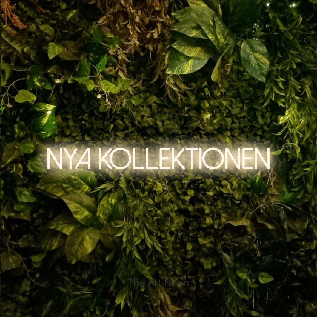 LED neon sign reading “nya kollektionen”, arranged in a single line.