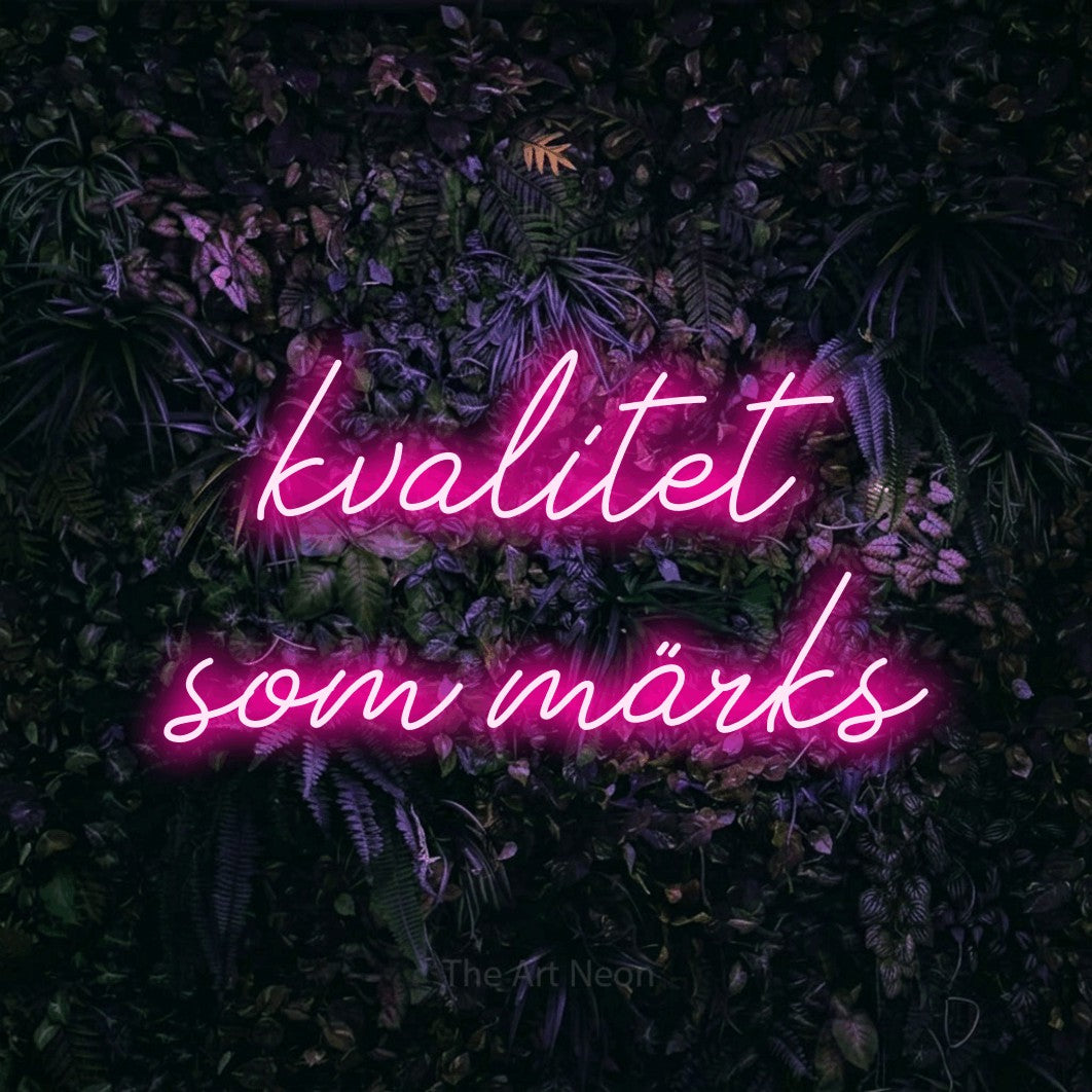LED neon sign reading “kvalitet som märks”, arranged in 2 lines.