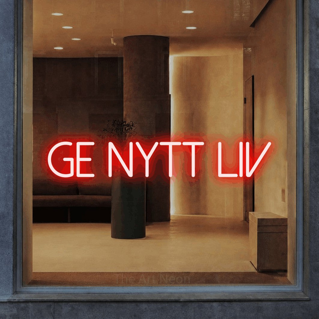 LED neon sign reading “ge nytt liv”, arranged in a single line.