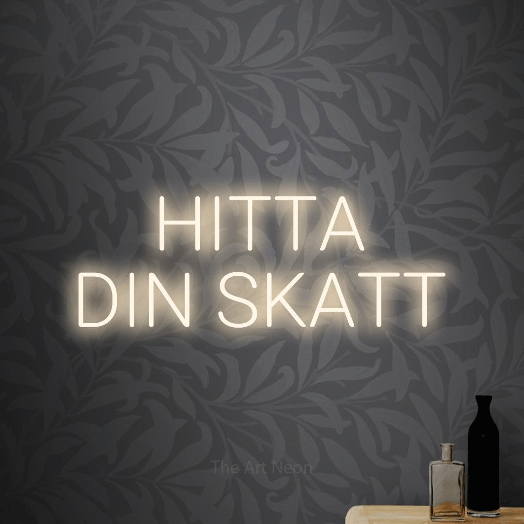 LED neon sign reading “HITTA DIN SKATT”, arranged in 2 lines.