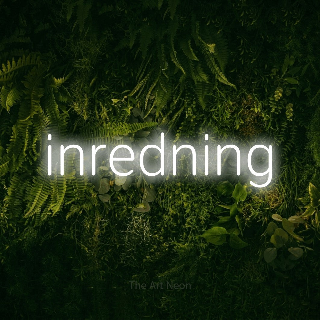 LED neon sign reading “inredning”, arranged in a single line.