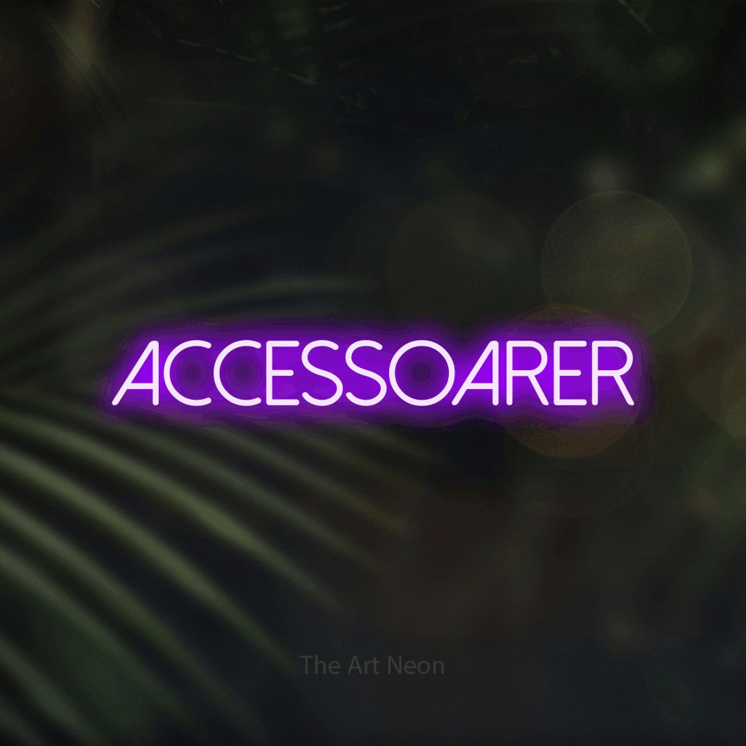 LED neon sign reading “accessoarer”, arranged in a single line.