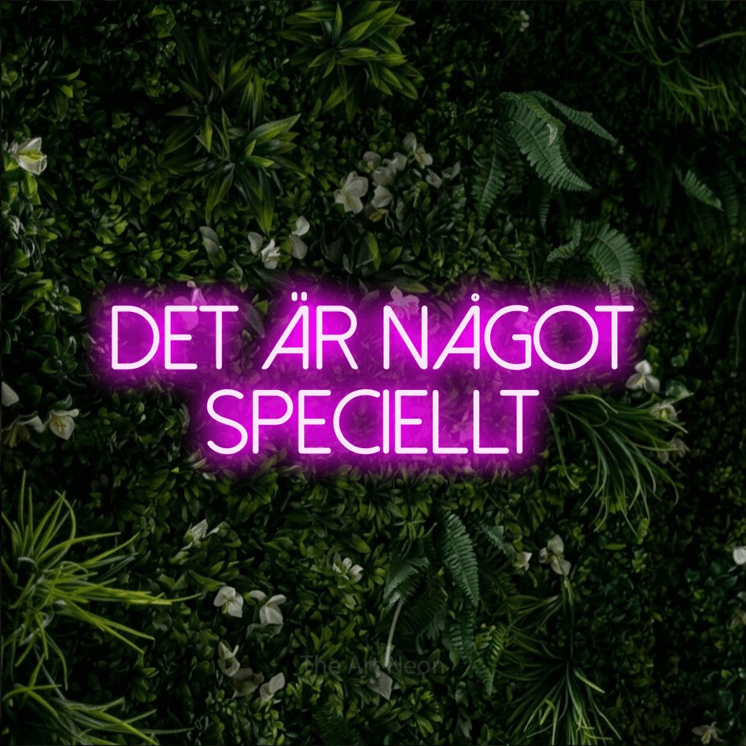 LED neon sign reading “det är något SPECIELLT”, arranged in 2 lines.