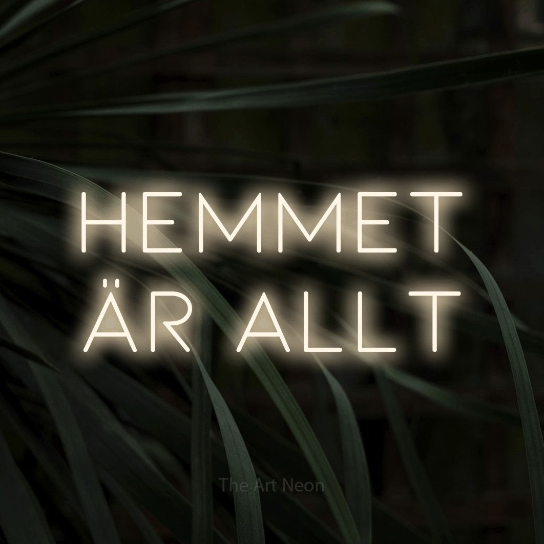LED neon sign reading “hemmet är allt”, arranged in 2 lines.