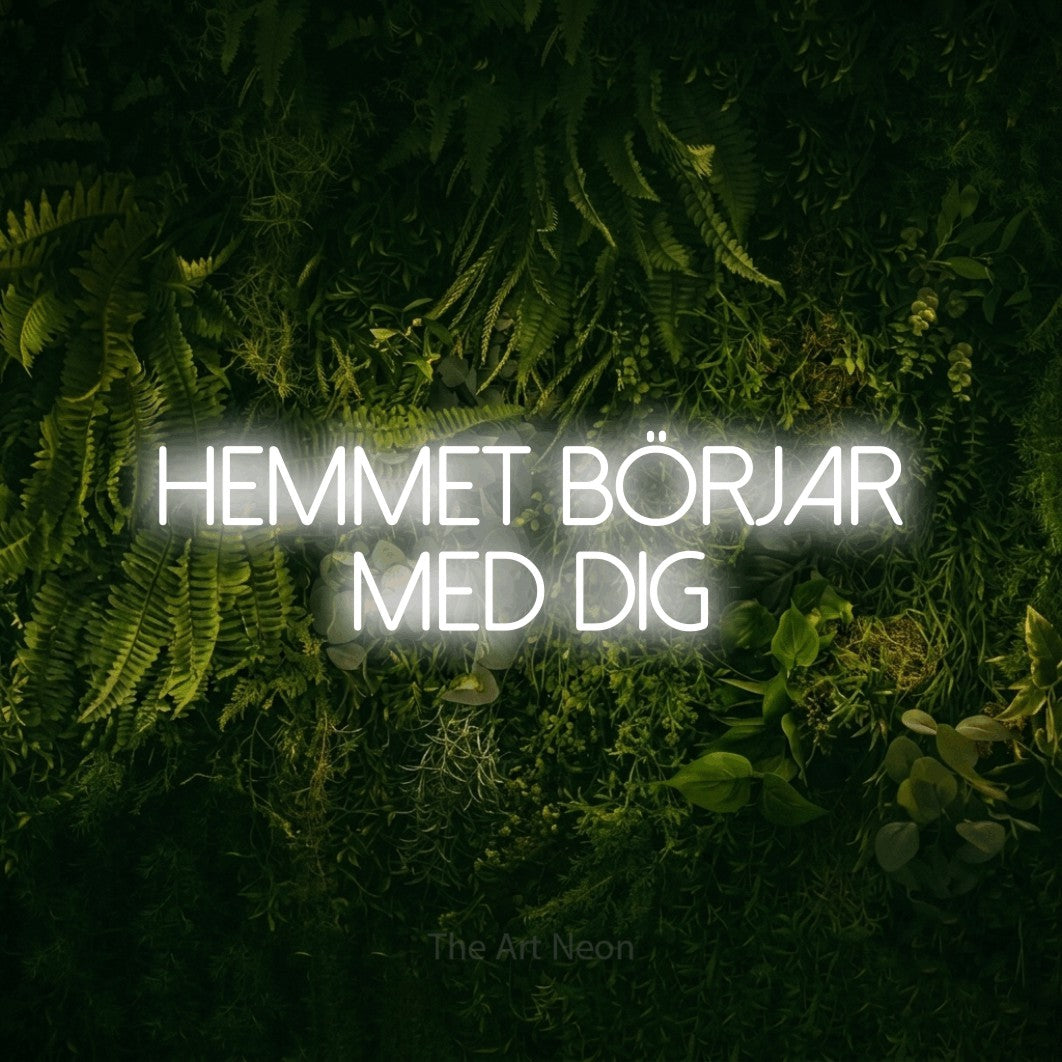 LED neon sign reading “hemmet börjar med dig”, arranged in 2 lines.