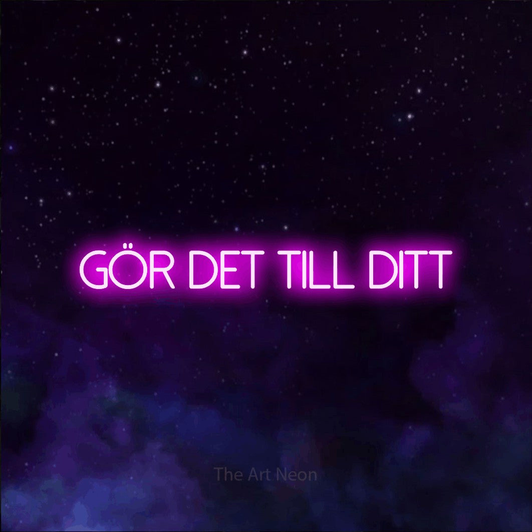 LED neon sign reading “GÖR DET TILL DITT”, arranged in a single line.