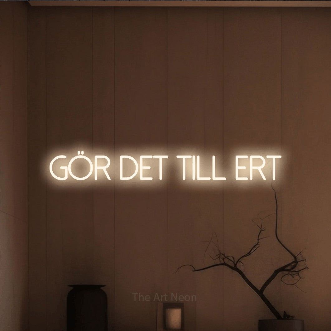 LED neon sign reading “Gör Det Till Ert”, arranged in a single line.