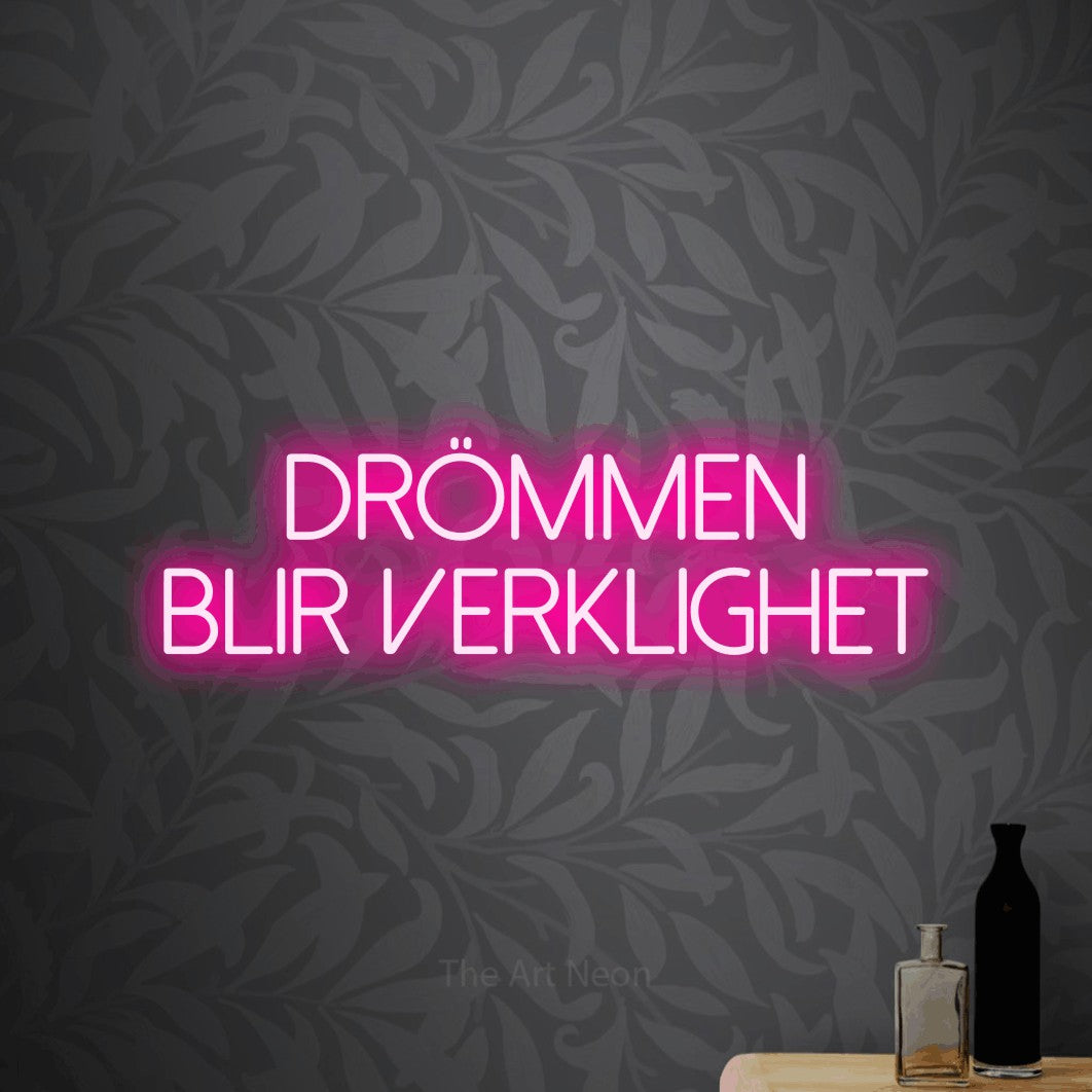 LED neon sign reading “Drömmen Blir Verklighet”, arranged in 2 lines.