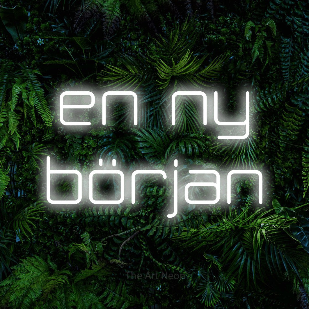 LED neon sign reading “en ny början”, arranged in 2 lines.