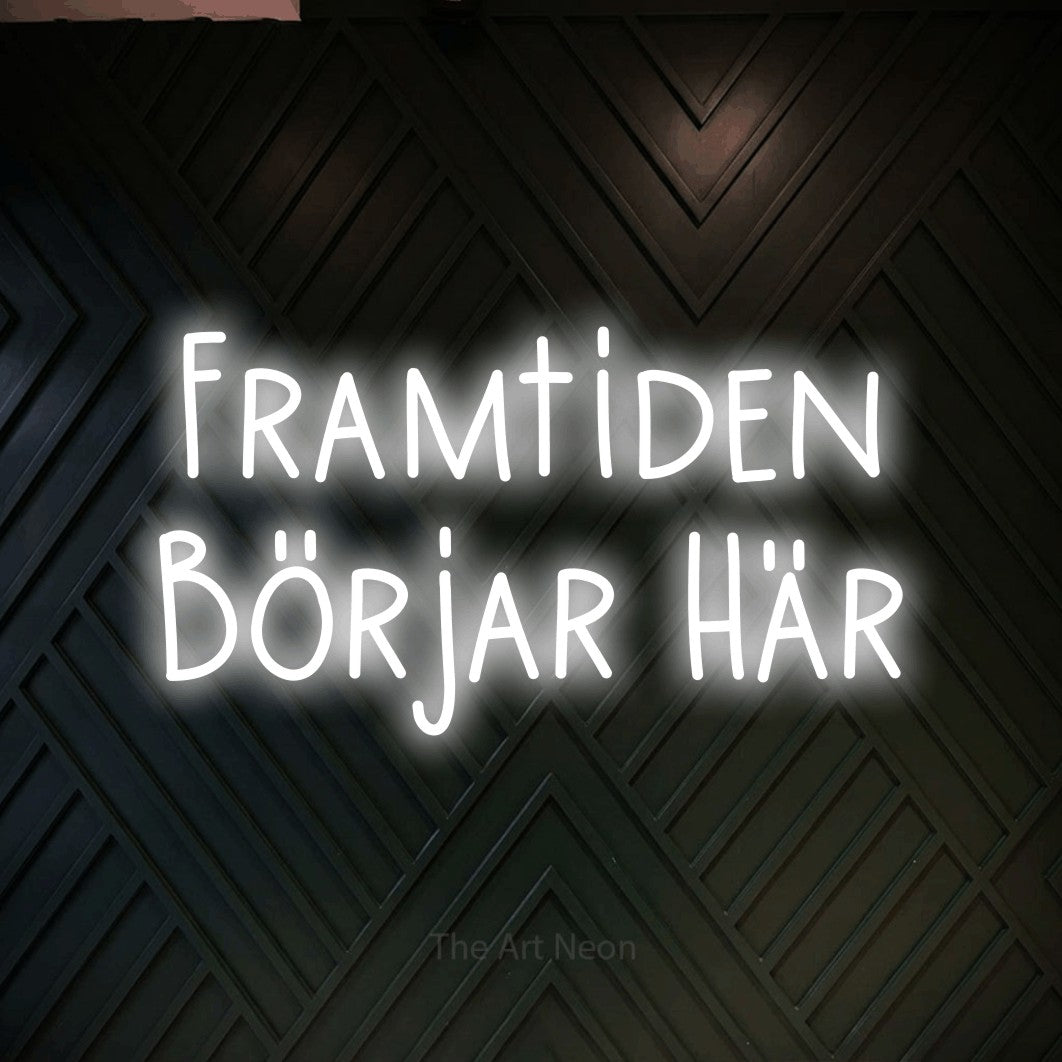 LED neon sign reading “Framtiden Börjar Här”, arranged in 2 lines.