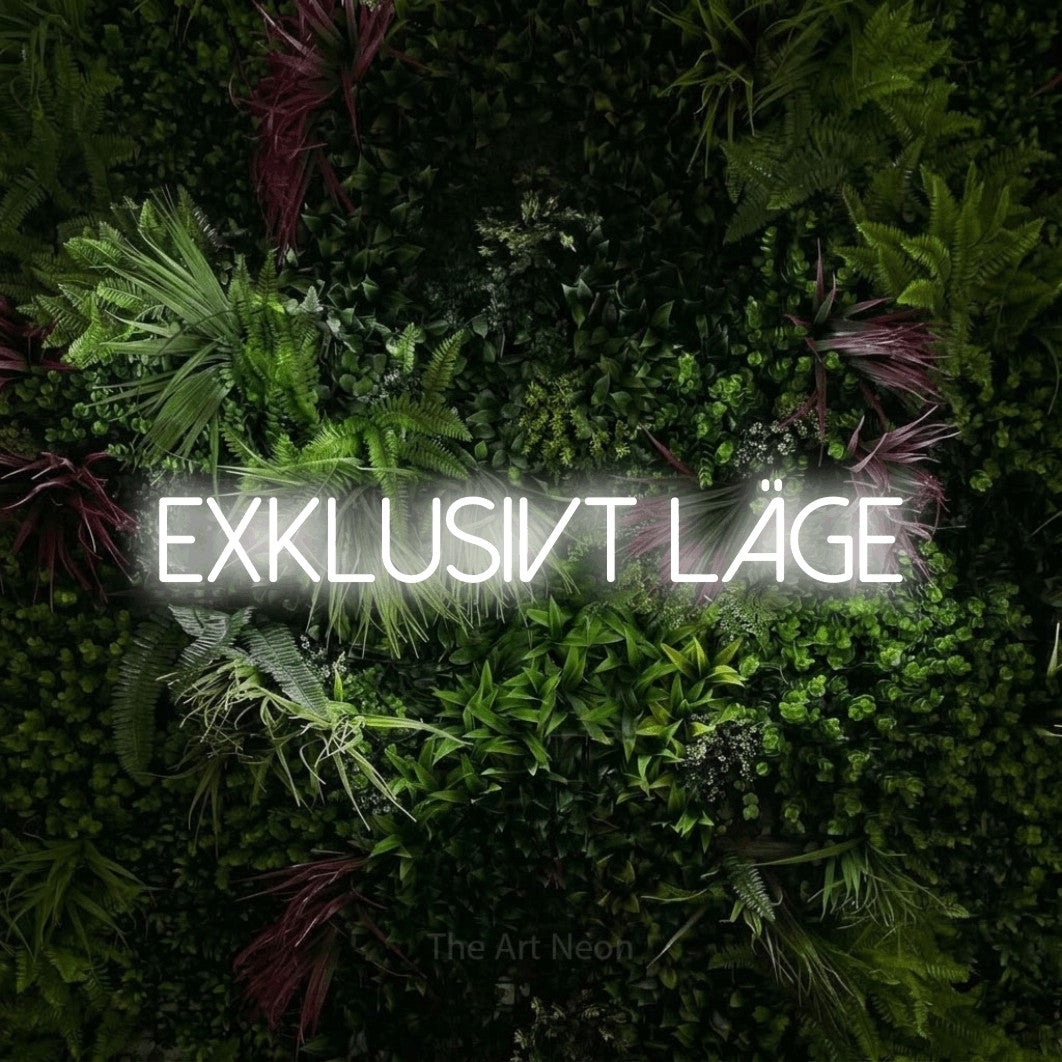 LED neon sign reading “EXKLUSIVT läge”, arranged in a single line.