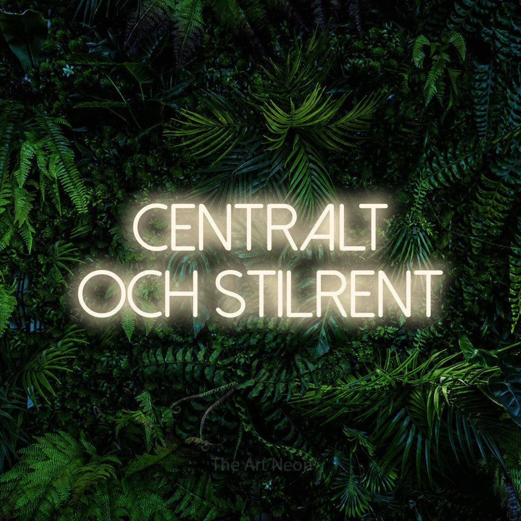 LED neon sign reading “Centralt och stilrent”, arranged in 2 lines.