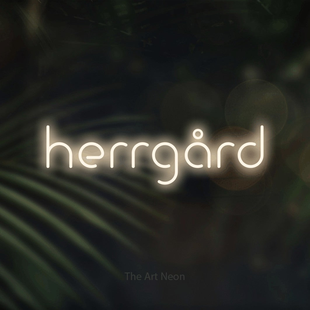 LED neon sign reading “herrgård”, arranged in a single line.
