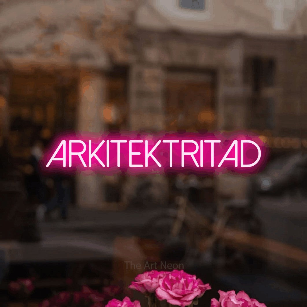 LED neon sign reading “Arkitektritad”, arranged in a single line.