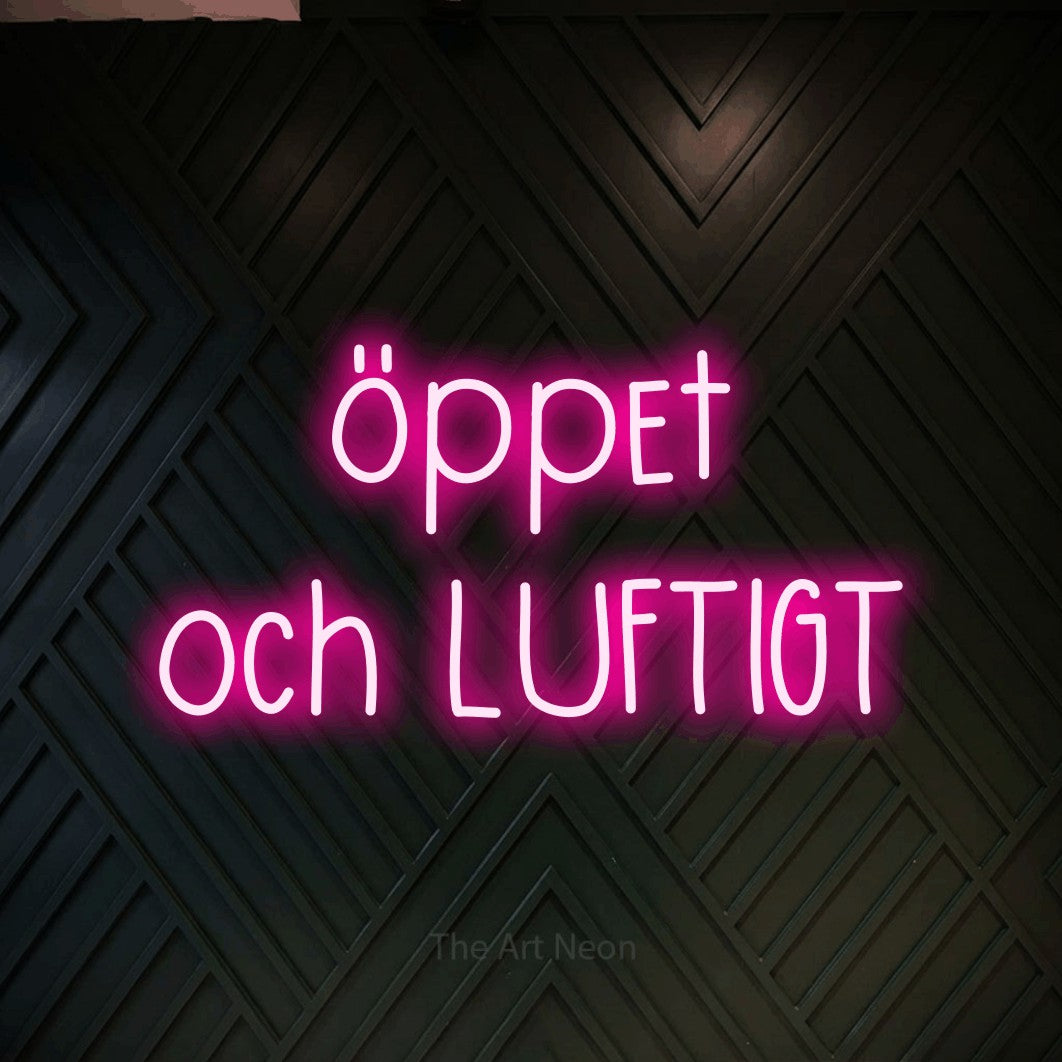 LED neon sign reading “öppet och LUFTIGT”, arranged in 2 lines.