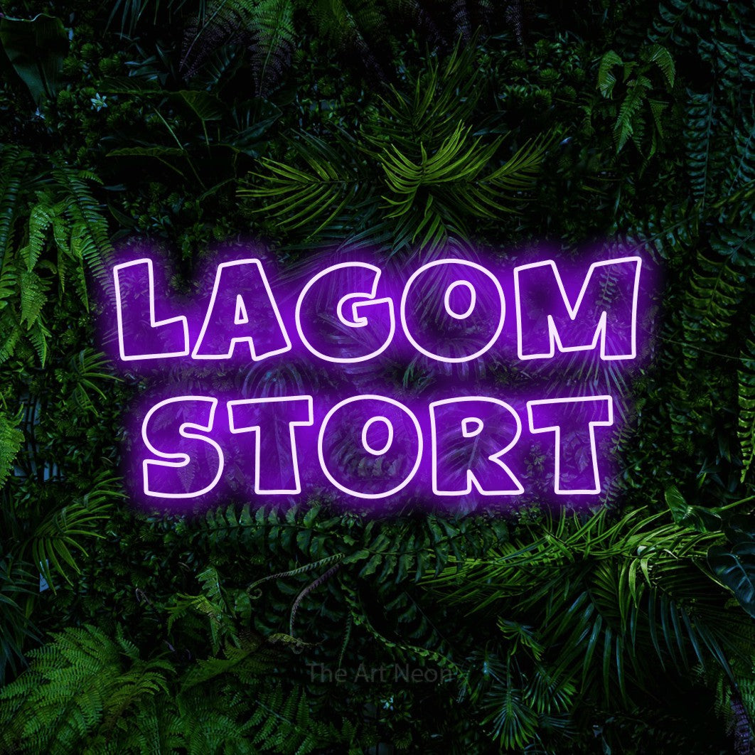 LED neon sign reading “Lagom Stort”, arranged in 2 lines.