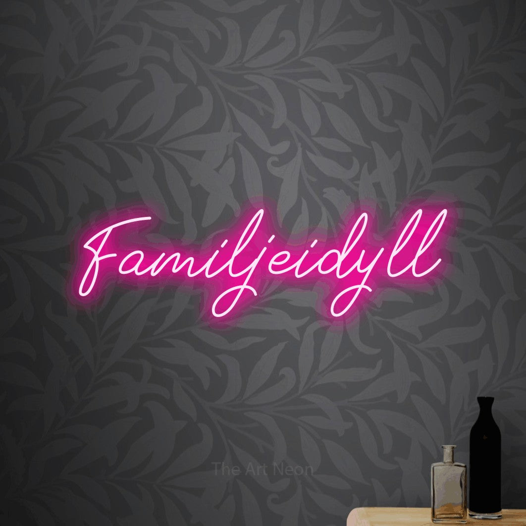 LED neon sign reading “Familjeidyll”, arranged in a single line.