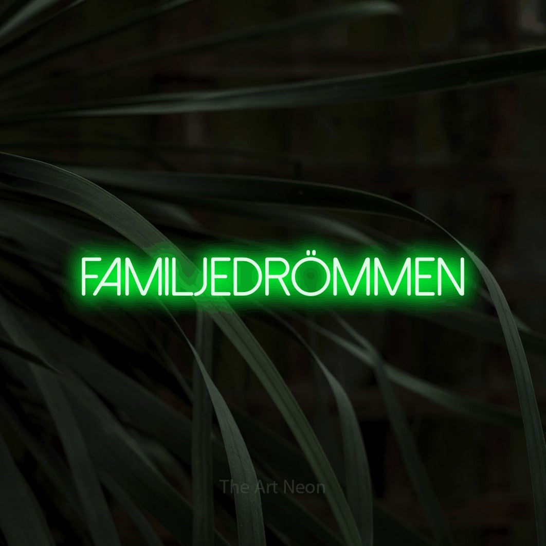 LED neon sign reading “Familjedrömmen”, arranged in a single line.