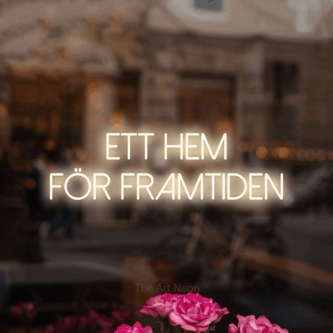 LED neon sign reading “Ett Hem För Framtiden”, arranged in 2 lines.