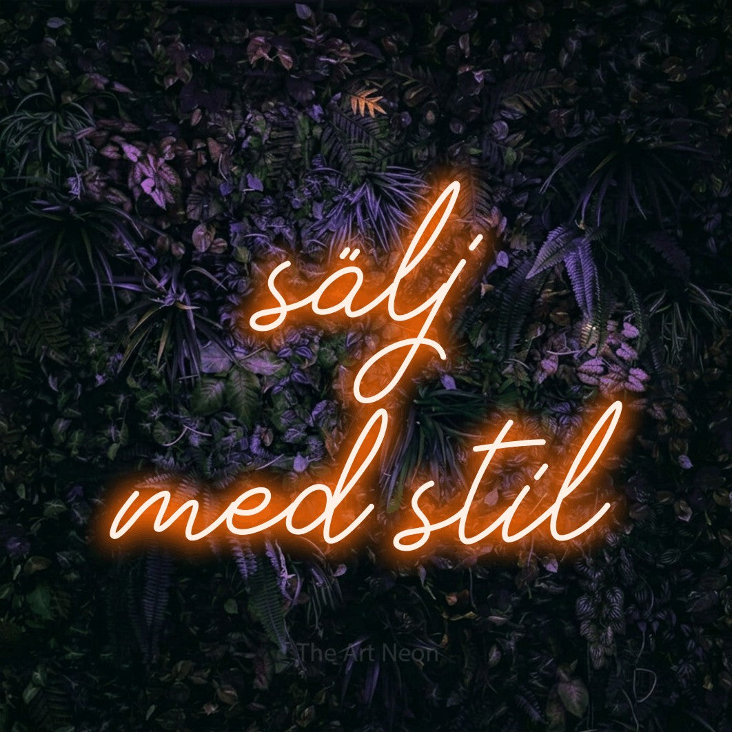 LED neon sign reading “sälj med stil”, arranged in 2 lines.