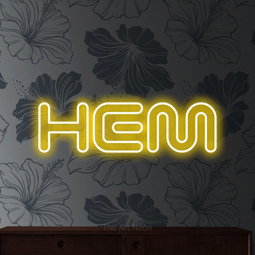 LED neon sign reading “HEM”, arranged in a single line.