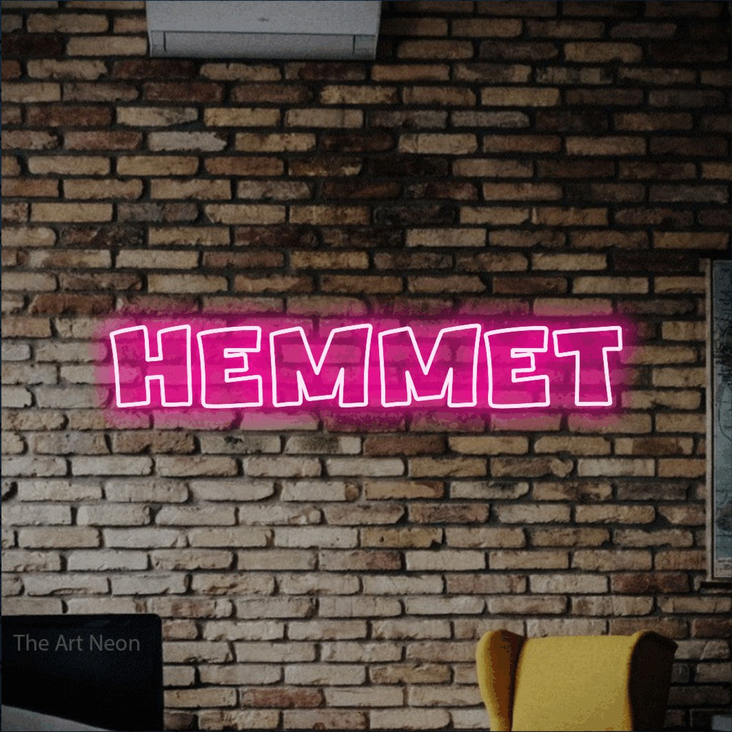 LED neon sign reading “hemmet”, arranged in a single line.