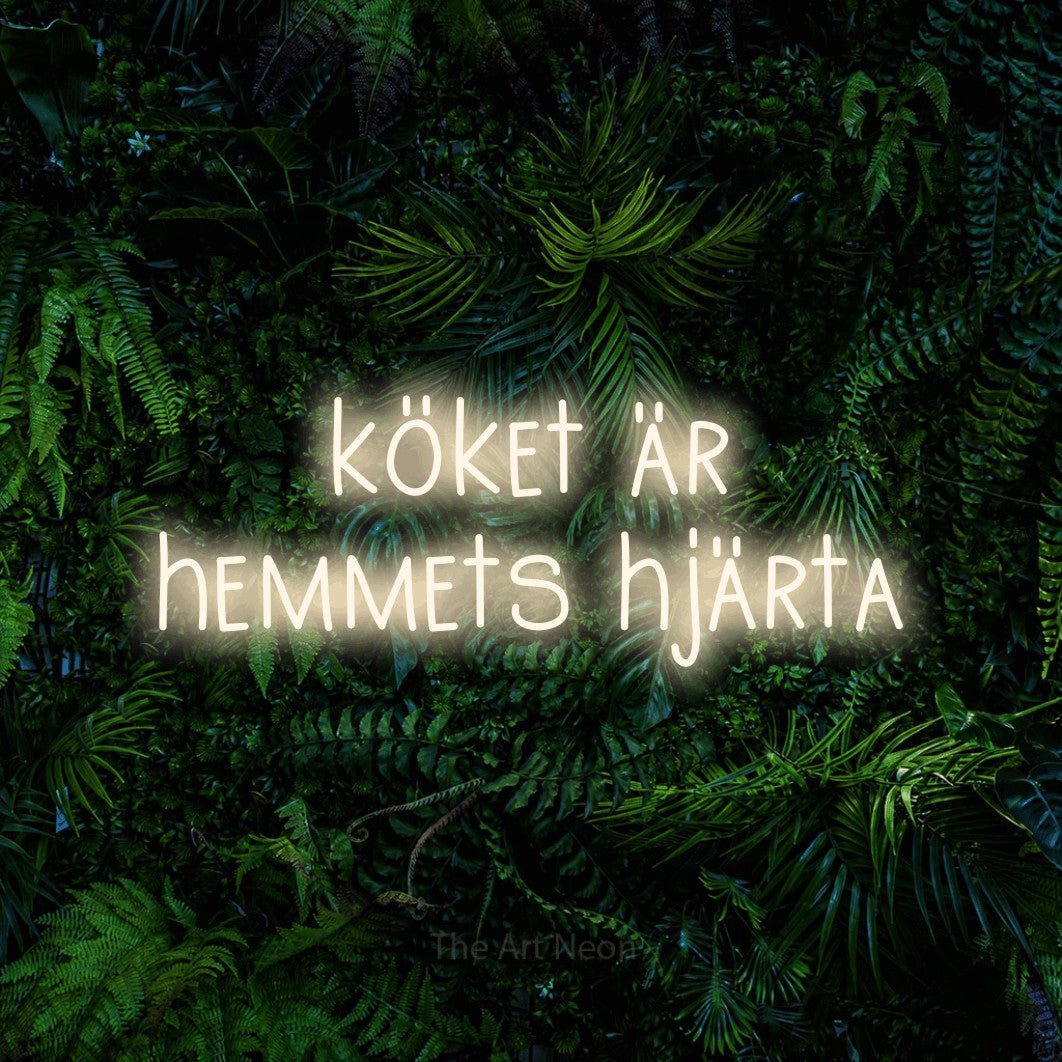 LED neon sign reading “köket är hemmets hjärta”, arranged in 2 lines.